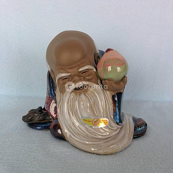Old Man With Peach