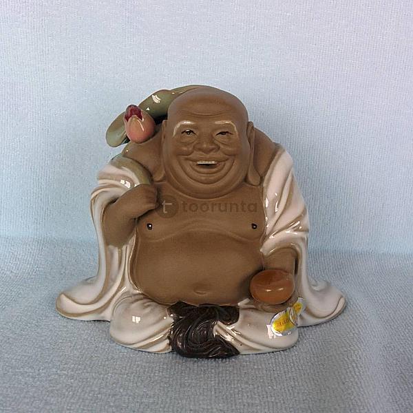 Laughing Buddha With Leaf